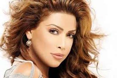 بالصور.. نوال الزغبي تتعلم الملاكمة