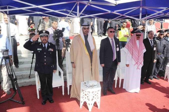 الوزير العبدالله وقيادات الاطفاء خلال تحية العلم﻿