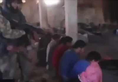 بالفيديو.. +18 .. "داعش" تعدم سوريين بالرصاص الحي بدم بارد وسط توسلات مسن وطفل