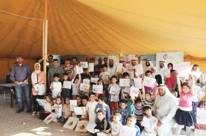 الحبيط والفوزان وعدد من الاطفال المشاركين