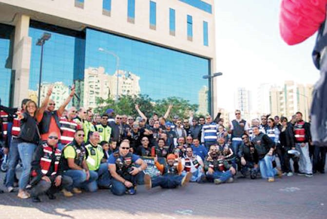 المشاركون بالحملة في لقطة تذكارية ﻿