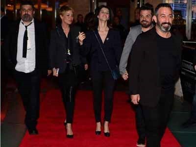 بالصور.. بيرين سآت في السينما مع خطيبها بملابس الحداد