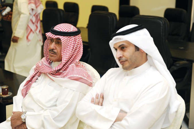 الزميلان نائب رئيس التحرير عدنان الراشد وذعار الرشيدي