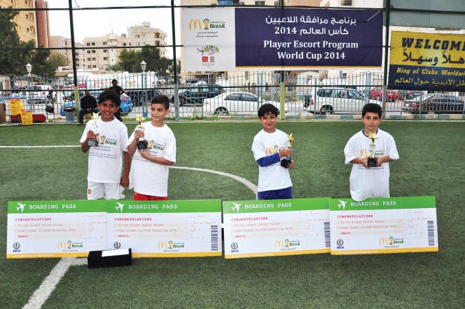 الفائزون ببرنامج مرافقو اللاعبين خلال بطولة كاس العالم FIFA 2014