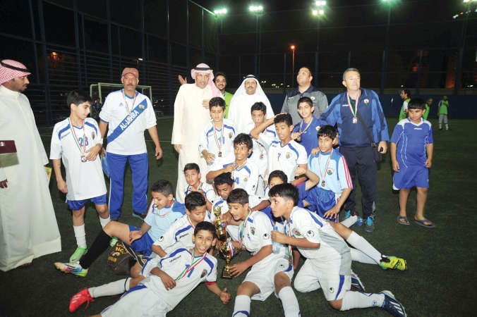 فرحة اللاعبين الفائزين باللقب﻿