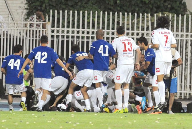 فرحة لاعبي الكويت بالفوز باللقب	هاني الشمري ﻿