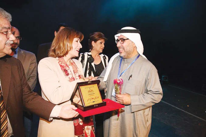 عمر الجاسر مكرما من وزيرة الثقافة الاردنية
