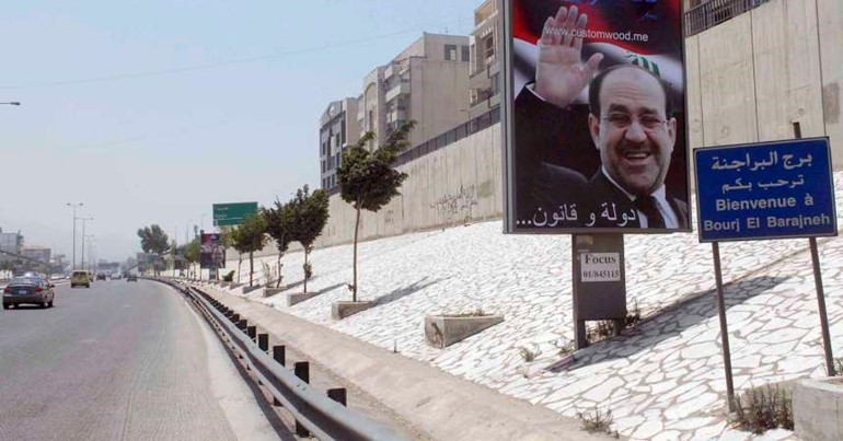 صور رئيس الحكومة العراقية نوري المالكي مرفوعة على طريق المطار في بيروت محمود الطويل