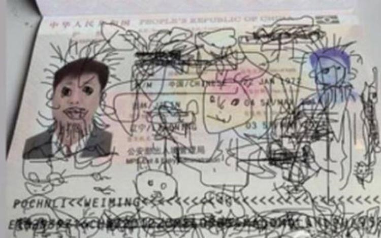 صورة: أب عالق بين دولتين بسبب «شخابيط» ابنه على جواز السفر
