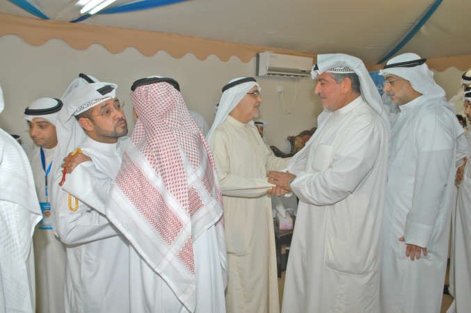 احمد لاري يرحب بناخبي الدائرة وبجانبه هشام البغلي
﻿