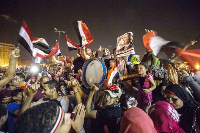 جانب من احتفال المصريين في ميدان التحرير باعلان فوز المشير عبدالفتاح السيسي برئاسة مصر افپ
