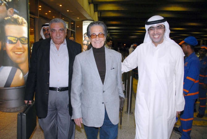 مع الزميل احمد الفضلي وفي الوسط انيس منصور﻿