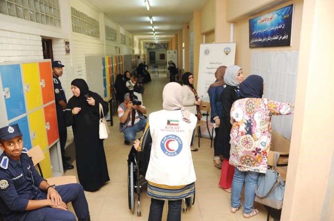 ناخبات يبحثن عن اصواتهن
﻿