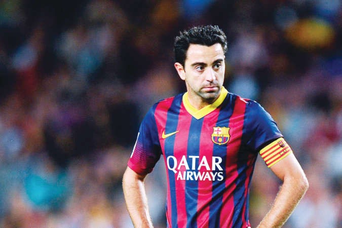 نجم برشلونة تشافي حسم امره بالبقاء مع البارسا