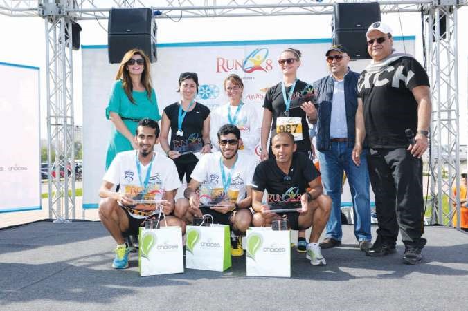 الفائزون في سباق RunQ8 في عام 2013