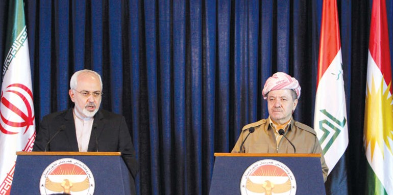 رئيس اقليم كردستان العراق مسعود بارزاني في المؤتمر الصحافي مع وزير خارجية ايران محمد جواد ظريف في اربيل امس رويترز﻿