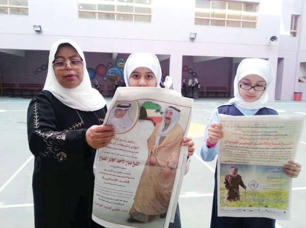 طالبات مدارس النجاة يطالعن التكريم في الصحف﻿