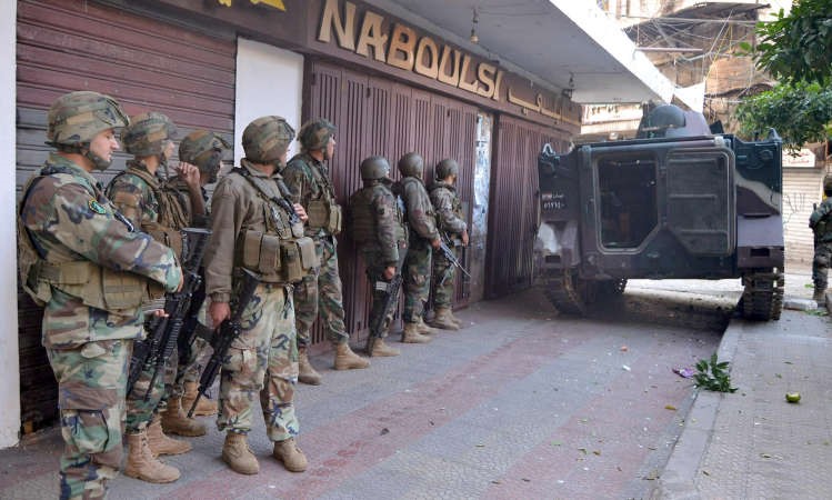 الجيش اللبناني خلال مواجهاته مع المسلحين في طرابلس امس	محمود الطويل ﻿