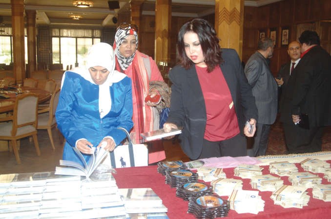 الزميلتان هناء السيد ومنى ششتر في المعرض المصاحب للاحتفال	 ناصر عبدالسيد﻿