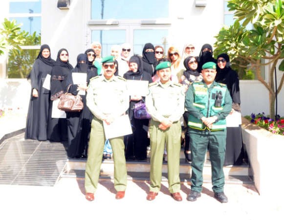 صورة جماعية لمنتسبي الحرس الوطني مع المتدربين 