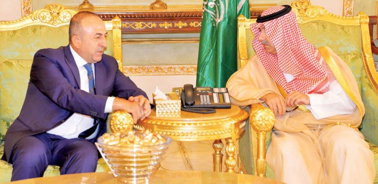 صاحب السمو الملكي الامير سعود الفيصل وزير الخارجية السعودي خلال استقباله نظيره التركي جاويش اوغلو في الرياض امسواس