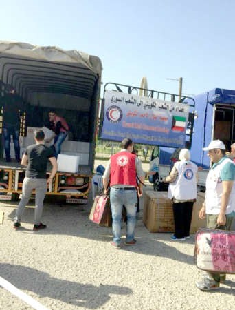 توزيع مساعدات الهلال الاحمر على النازحين السوريين في طرابلس﻿
