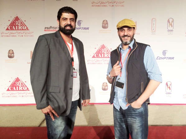 المخرج السينمائي احمد الخلف وخالد البريكي بعد عرض الفيلم