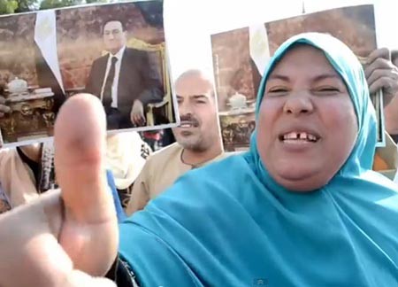 بالفيديو.. كيف احتفلت سيدة «شت أب يور ماوس أوباما» ببراءة مبارك ؟