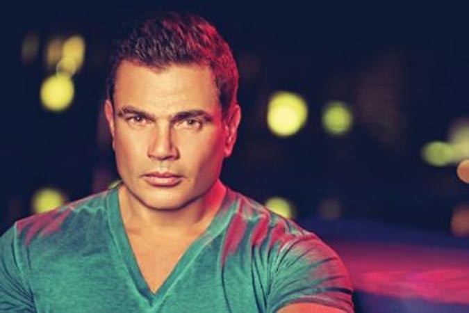 عمرو دياب ينشر صورة عمرها أكثر من 23 سنة