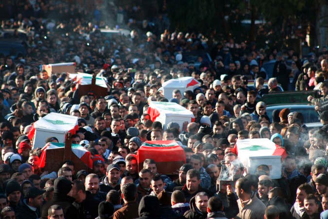 تشييع جماعي لقتلى الهجوم على المقهى في طرابلس امسمحمود الطويل 