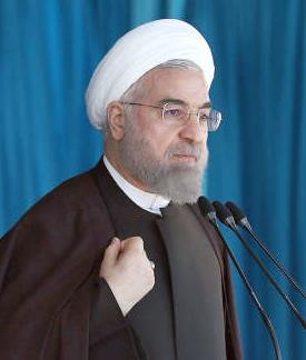 الرئيس الايراني حسن روحاني محذرا الدول التي تقف وراء انخفاض اسعار النفط العالميةافپ 