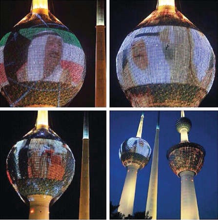 ابراج الكويت وقد ازدانت امس بصور صاحب السمو الامير وسمو ولي العهد والعلم الكويتي﻿