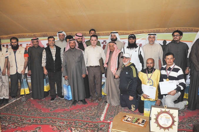 صورة جماعية للمكرمين خلال الماراثون