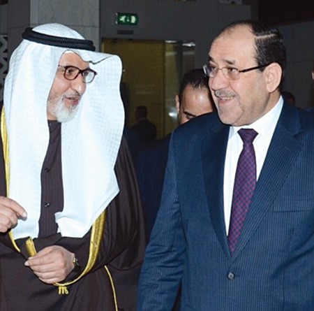 نائب الرئيس العراقي نوري المالكي مهنئا السفير غسان الزواوي