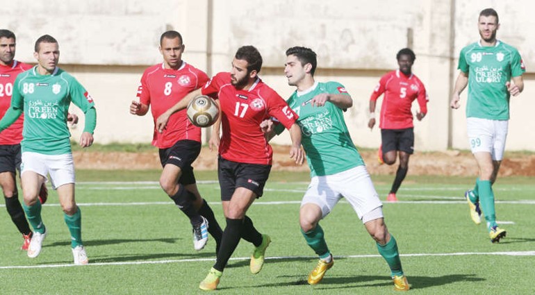 جانب من مباراة الاخاء الاهلي والانصار عدنان الحاج علي