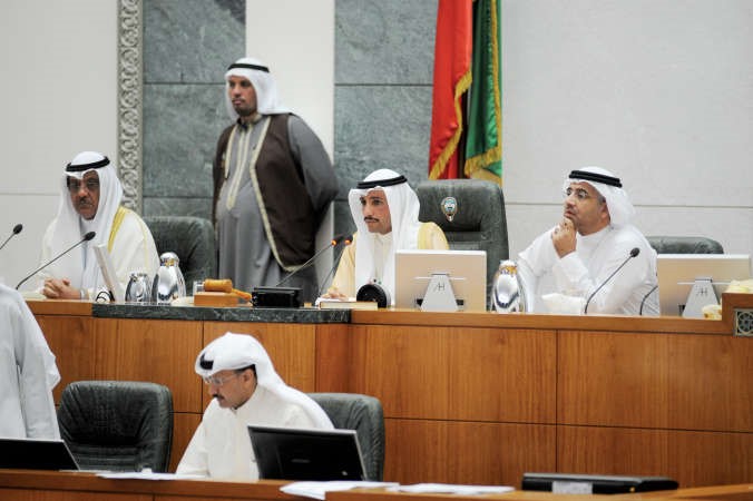 رئيس مجلس الامة مرزوق الغانم مترئسا الجلسة وبجواره نائبه مبارك الخرينج ودعودة الرويعي