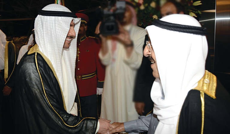 صاحب السمو مصافحا رئيس مجلس الامة مرزوق الغانم