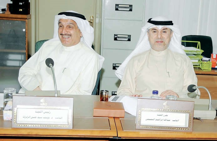 عبدالله التميمي وكامل العوضي اثناء الاجتماع