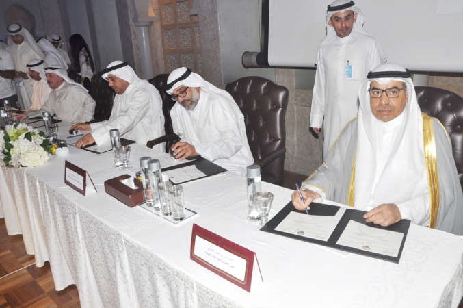 فوزي المجدلي يوقع البروتوكول