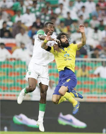 تحد سابق بين لاعب النصر حسين عبدالغني ومدافع الاهلي اسامة هوساوي