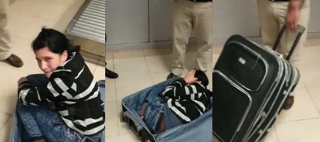 بالفيديو.. رجل يهرب امرأة في حقيبة سفر