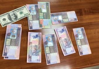  العملات المزورة ضبطت مع مصري في العبدلي 