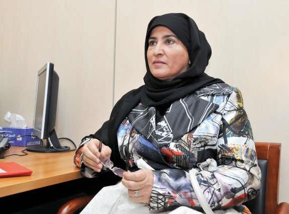 انوار القحطاني خلال تسجيل استمارة الترشح في انتخابات مجلس الامة نهاية 2012﻿