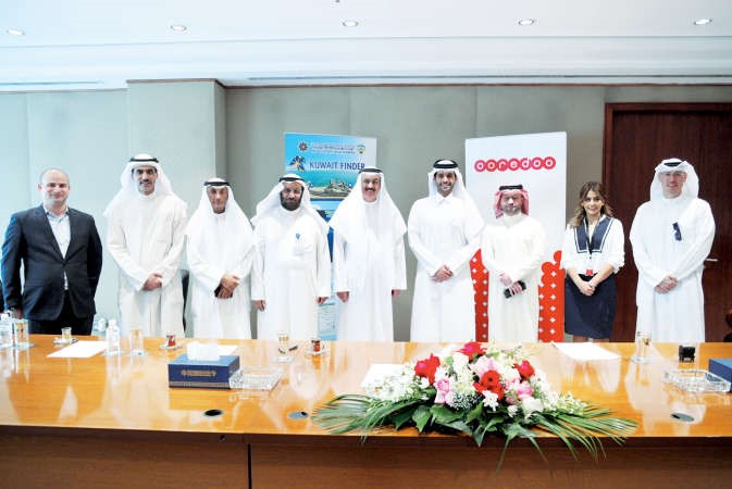 لقطة جماعية لفريق عمل Ooredoo وفريق عمل الهيئة العامة للمعلومات المدنية
