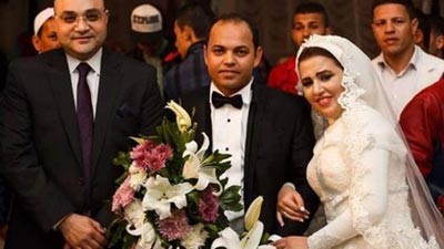 العروسان مع مندوب السيسي