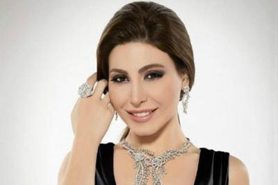 بالصور.. يارا تخطف أنظار جمهورها بفستان أحمر ناعم