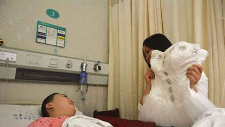 بالصور.. شاب يفاجئ خطيبته مريضة السرطان بجلسة تصوير زفاف داخل المستشفى