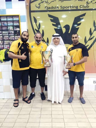 حسن ابوالحسن مع لاعبي الاصفر﻿