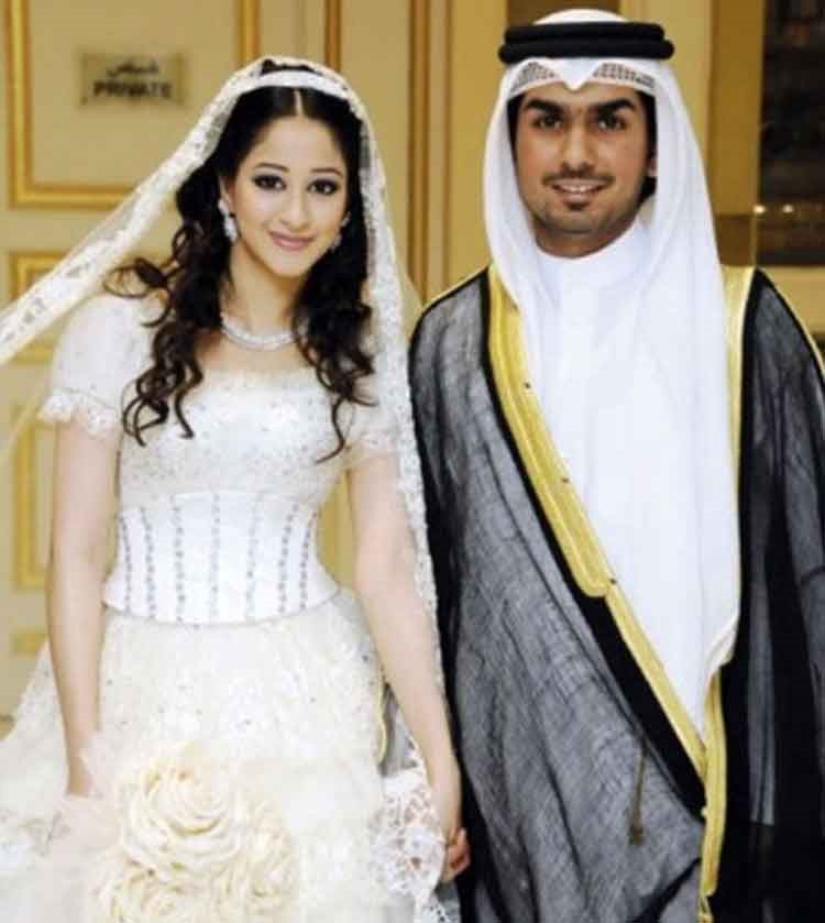 بالصور.. أسيل عمران وزوجها يجسدان تقلبات الحياة الزوجية في جلسة تصوير