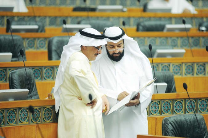 دعلي العمير وكامل العوضي